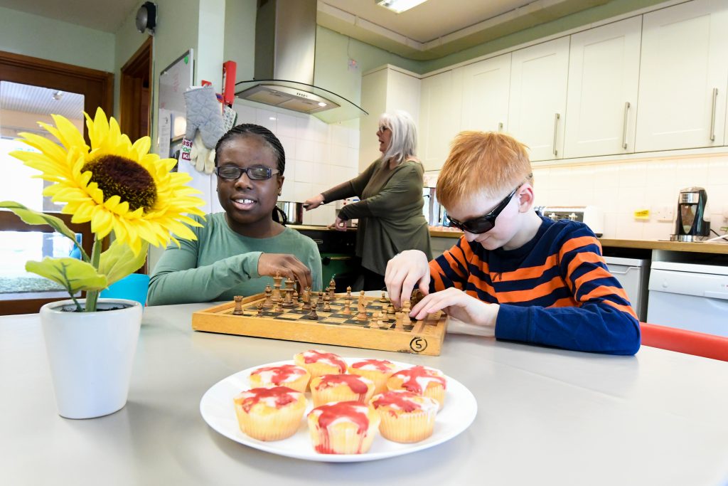 General - Students in a kitchen of a lower school house