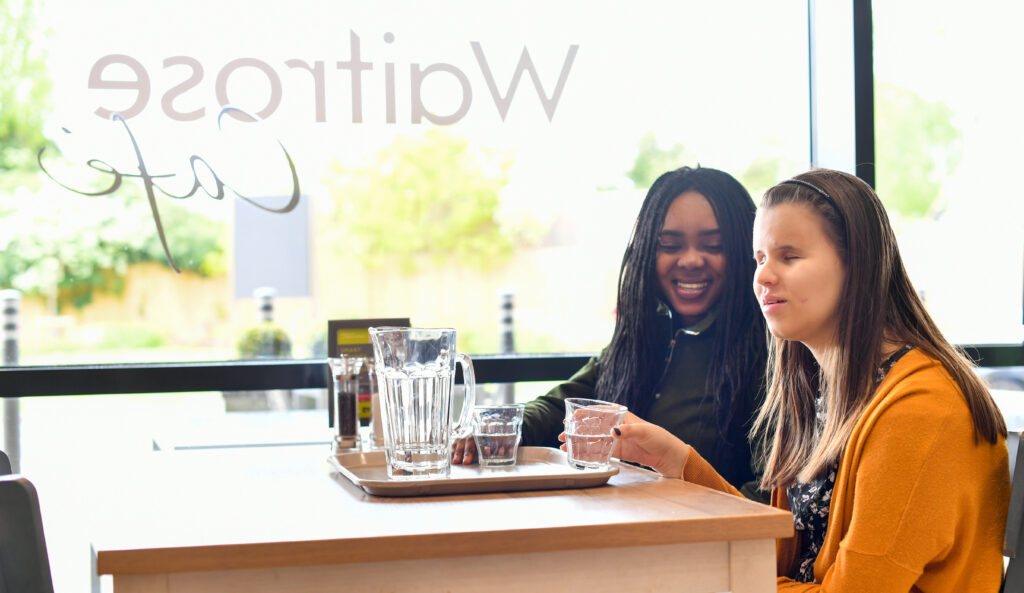 Students sat in a cafe