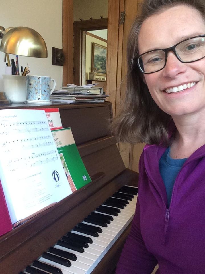 Mrs Moore at her Piano ready to teach virtually