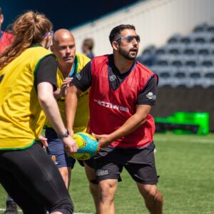 Action shot of Blind Rugby practical session