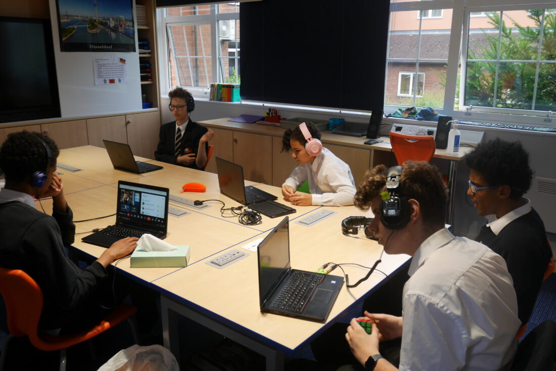 Students receiving a remote Spanish lesson from Spain