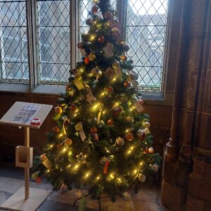 The glistening Christmas tree in all it's glory, filled with baubles