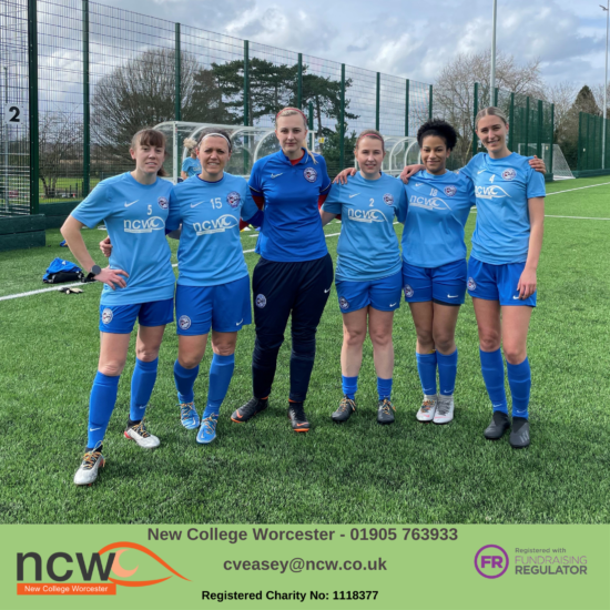 image of a team group photo. They are wearing a blue football kit with NCW on it