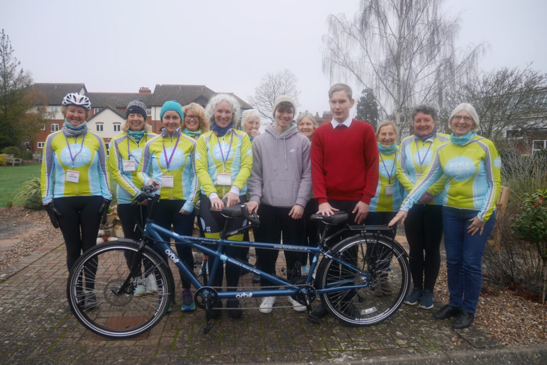 image of various members or WoW standing next to the tandem with Head Students Ilya and Luke