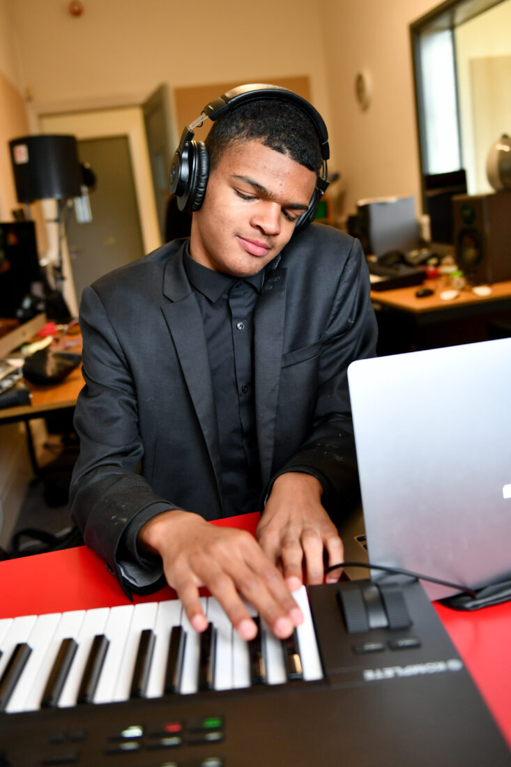 image of a student in a music studio