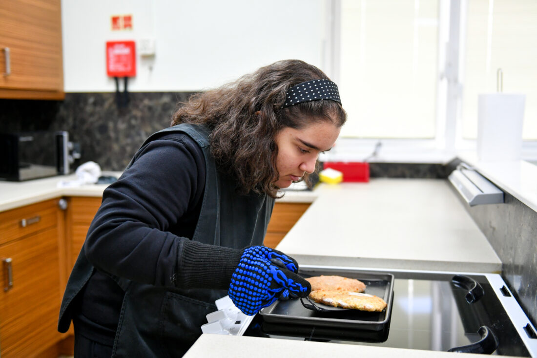 image of a student cooking during an ILS lesson
