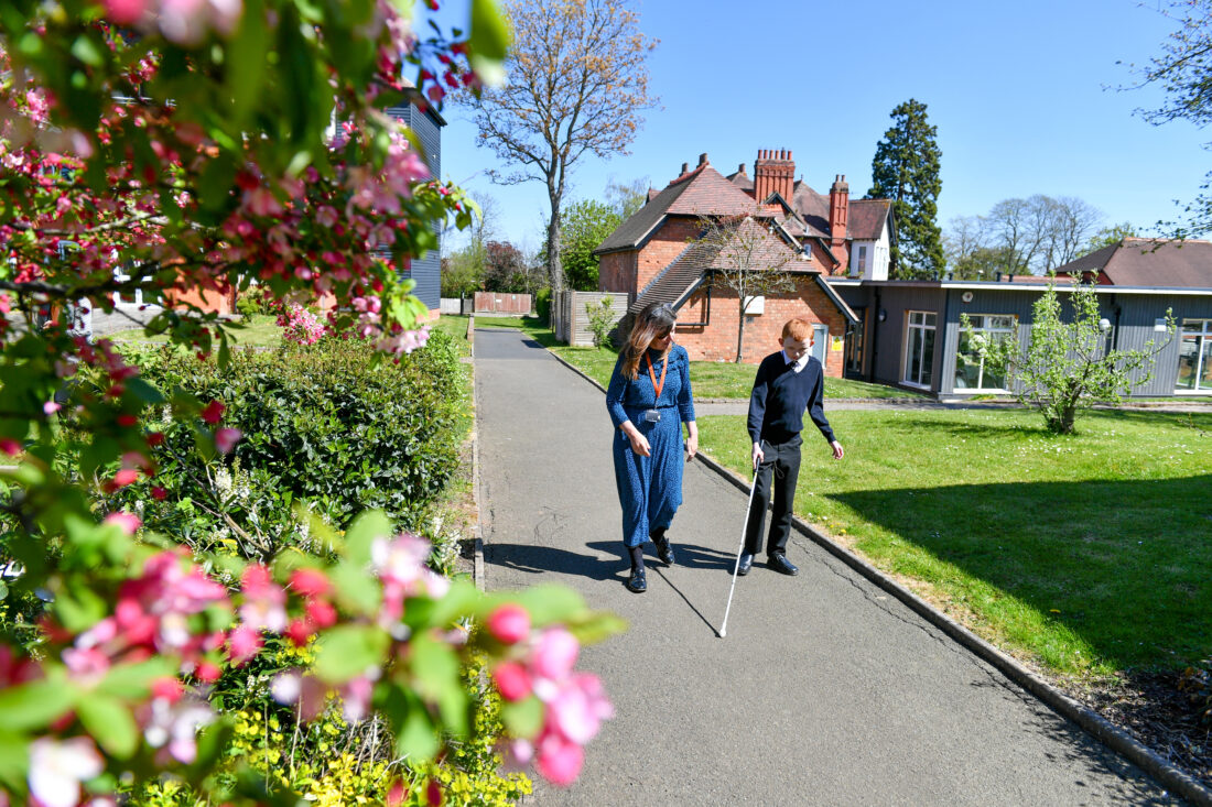 image of a student and Mobility Officer walking around the canpus