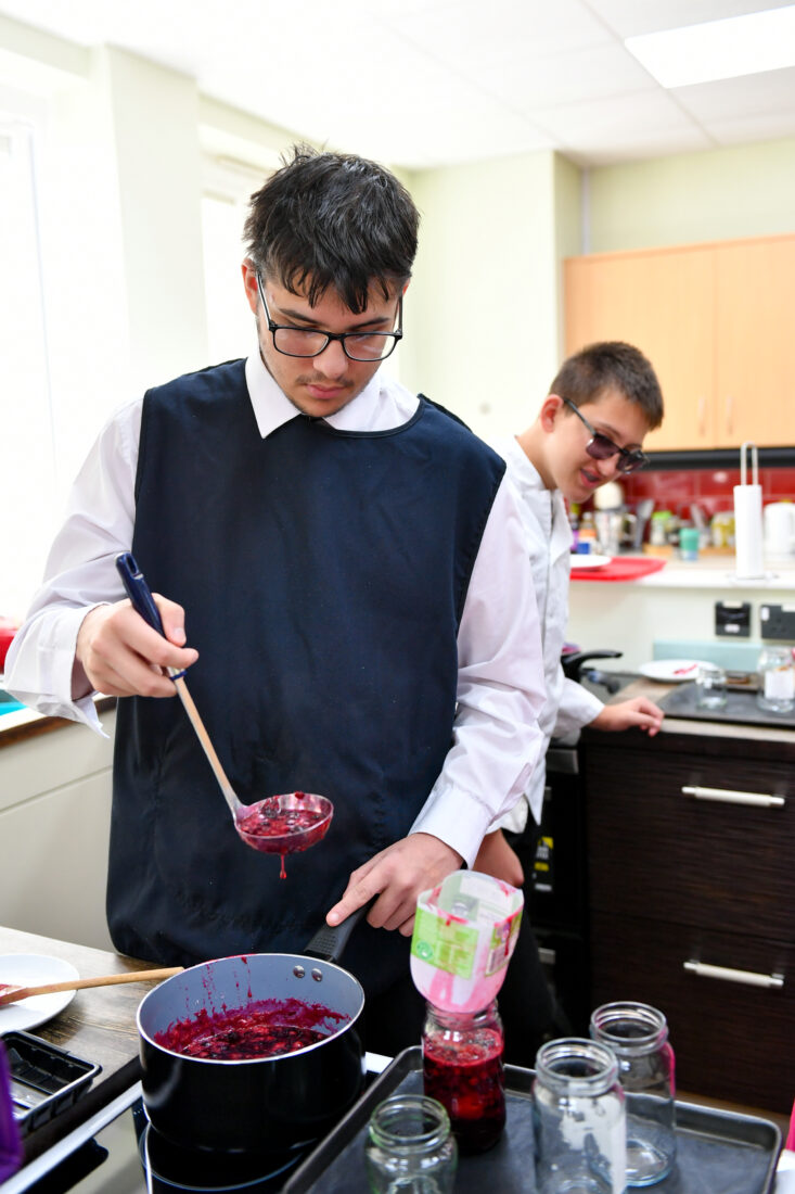 Photo of a student making jam
