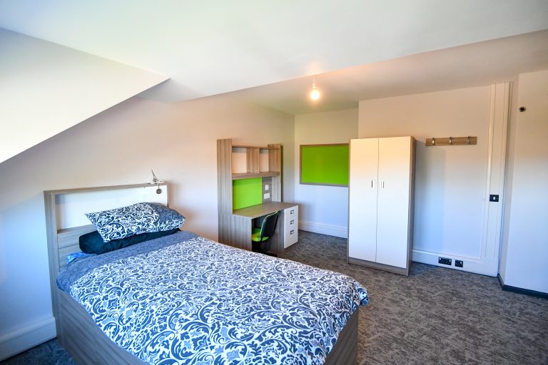 Photo of a bedroom which has been refurbished