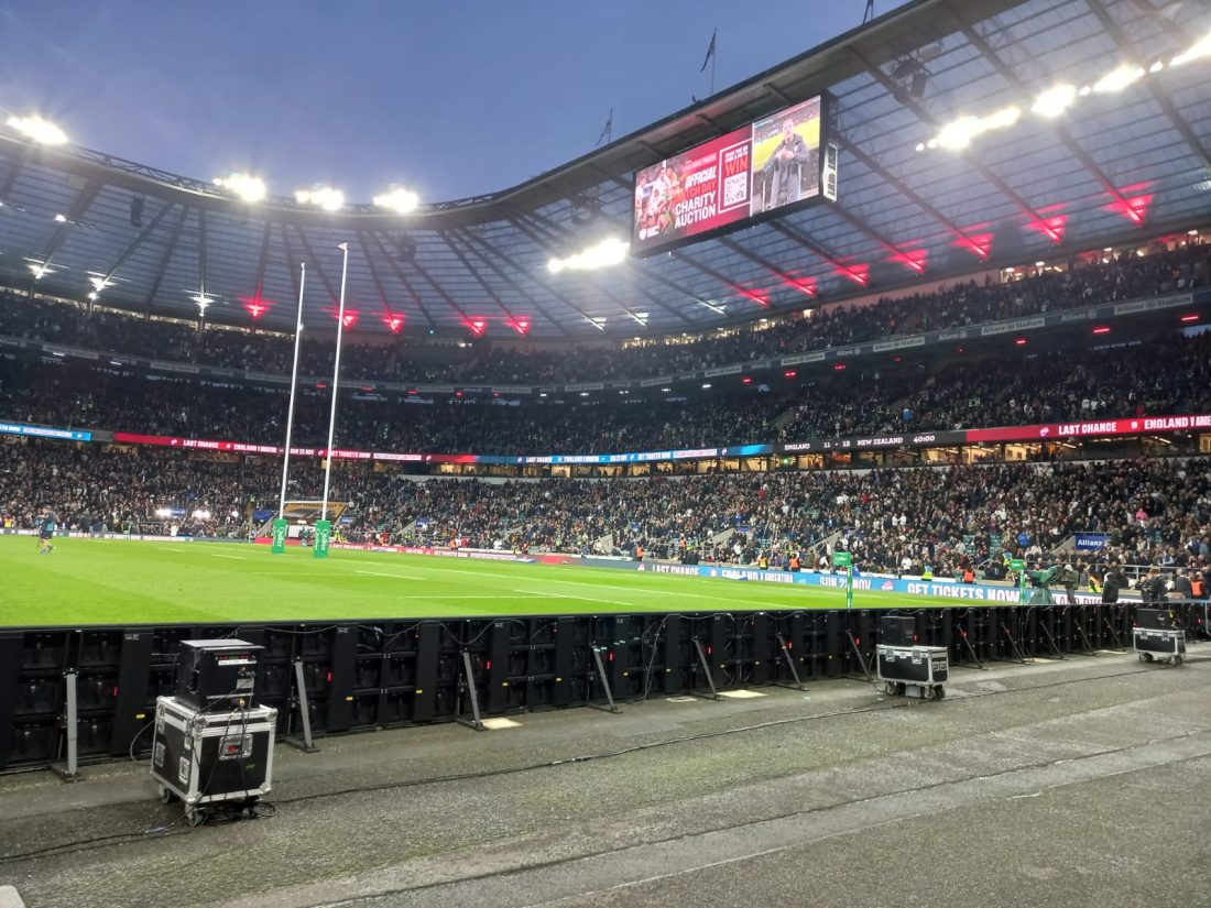 The pitch, stadium and crowds seated, waiting for the game to start