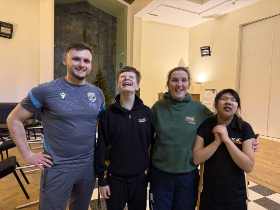 Albion Foundation leader, two students and Mrs Price smiling in the chapel