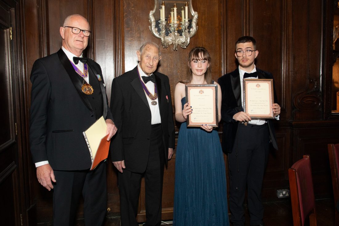Faith and Zac meeting master and receiving certificates