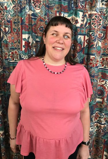 Lyndall Bywater headshot in a pink top