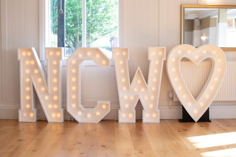 NCW huge light up letters and a heart on the dance floor