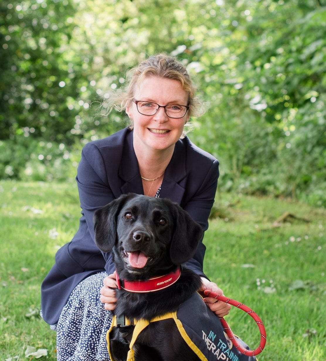 Rachel Perks with Tilly the therapy dog