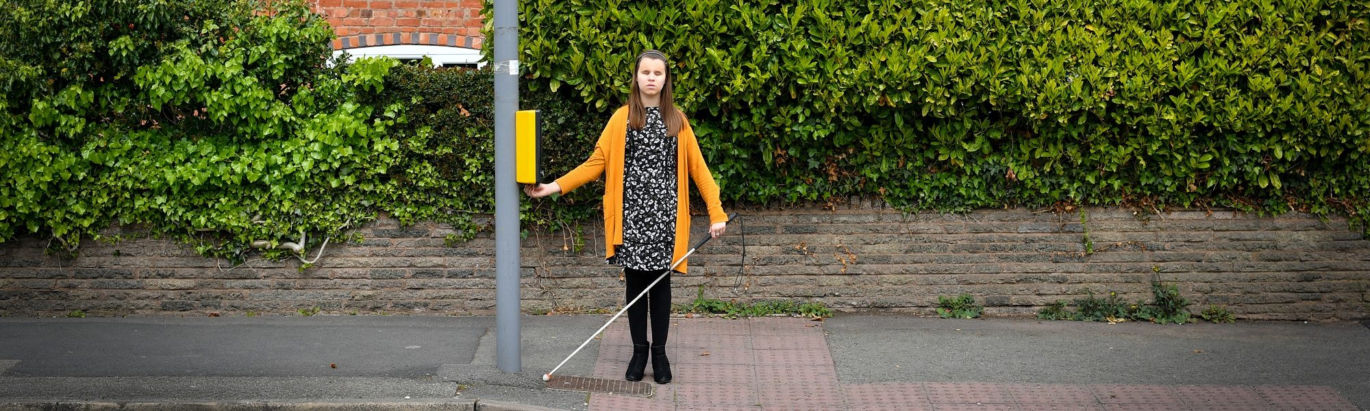 Student using Pelican Crossing